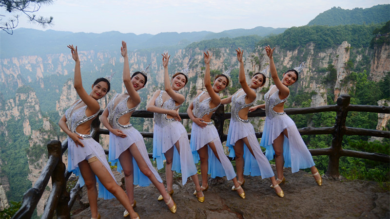 Actresses from Zhangjiajie Romantic Show dance in Tianzi Mountain